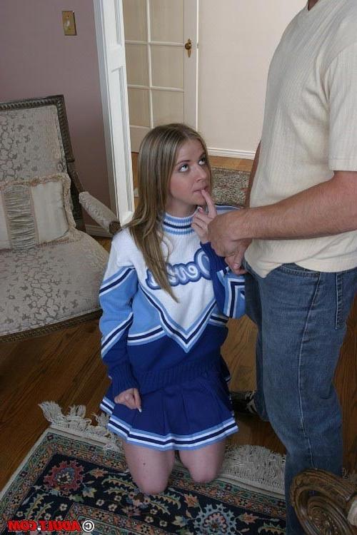 17P Young busty cheerleader takes on two massive schlongs