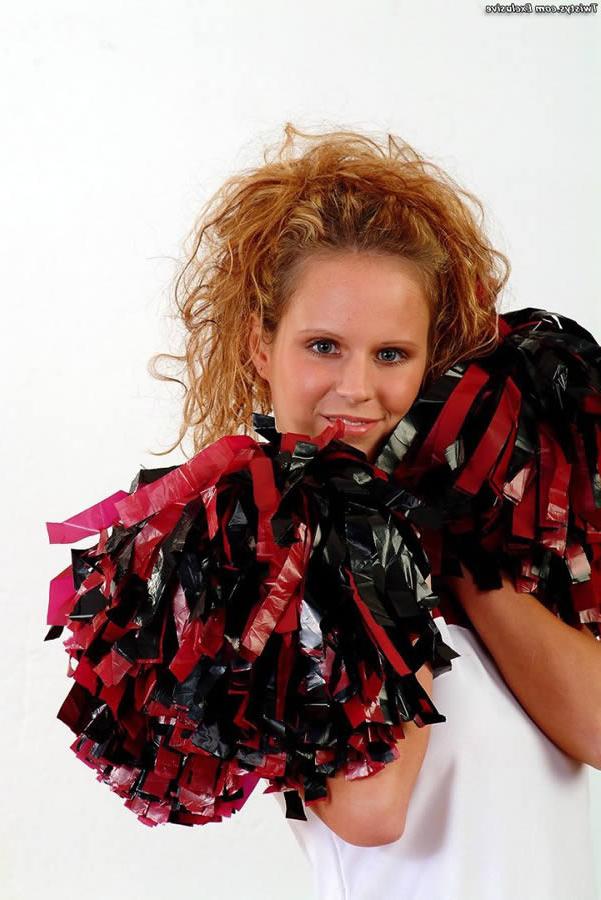 15P Big tit cheerleader showing off her assets