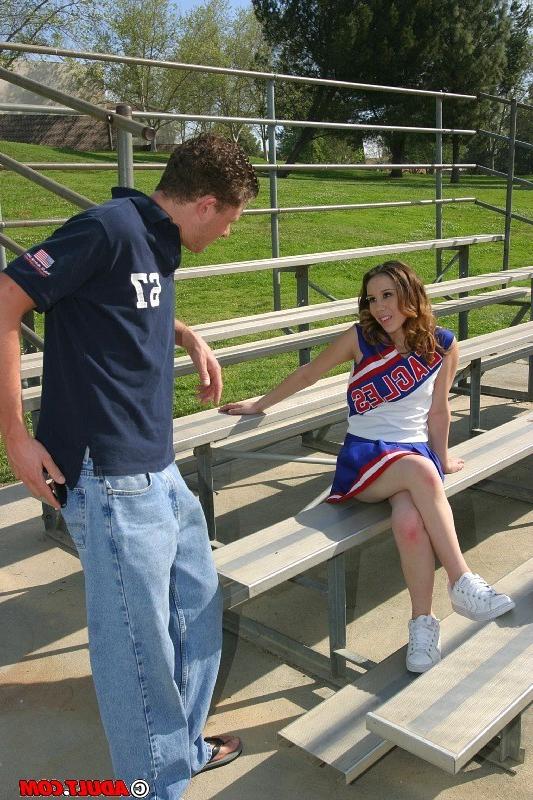 20P Hot Brunette Cheerleader Gives Two Guys A Blowjob