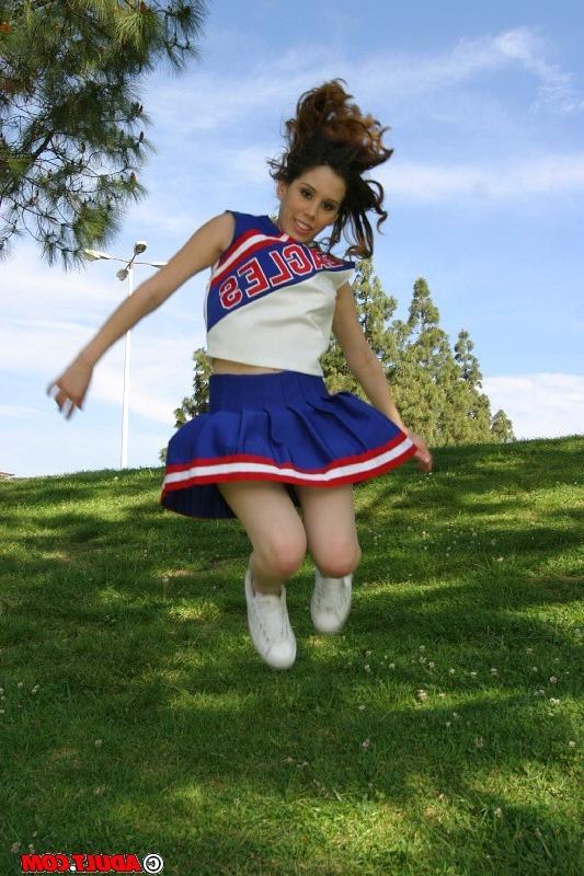 20P Hot Brunette Cheerleader Gives Two Guys A Blowjob