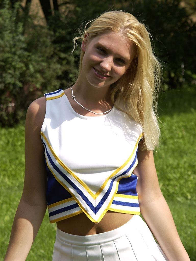 16P sexy teen cheerleader shows off her assets and fingers her pussy