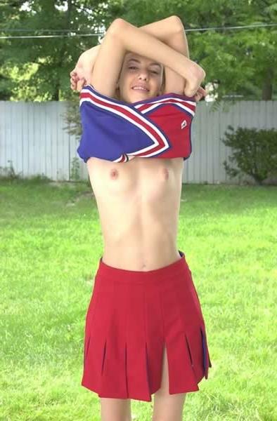 15P Cute cheerleader stripping outside