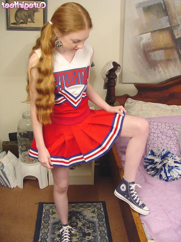 15P Redhead cheerleader with hairy pussy playing with her feet