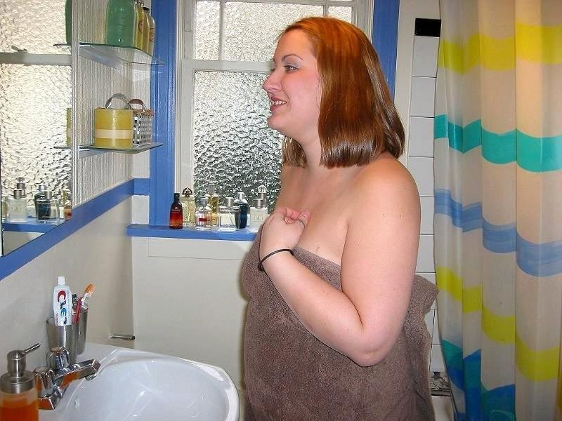 16P Naughty fat amateur taking a shower and washing her pussy