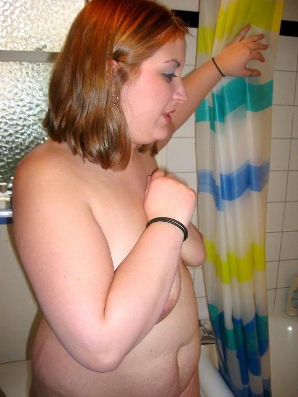 16P Naughty fat amateur taking a shower and washing her pussy