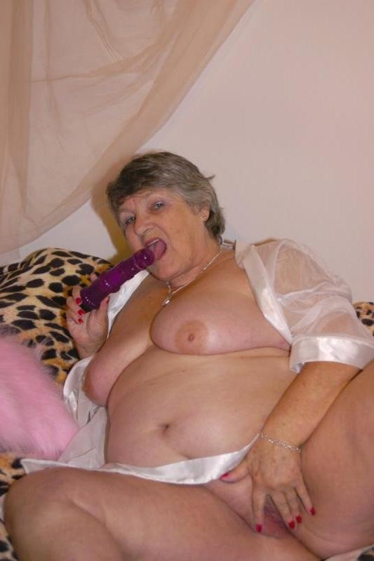 20P Horny fat mature stuffing her pussy with a dildo