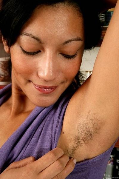 15P dark haired Rosalee exposes her fury pussy