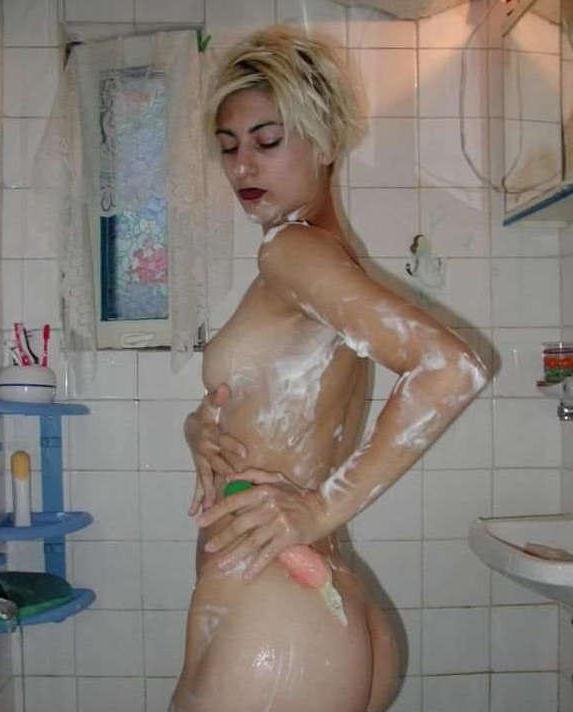16P Pictures of an emo babe playing with herself in the bathroom