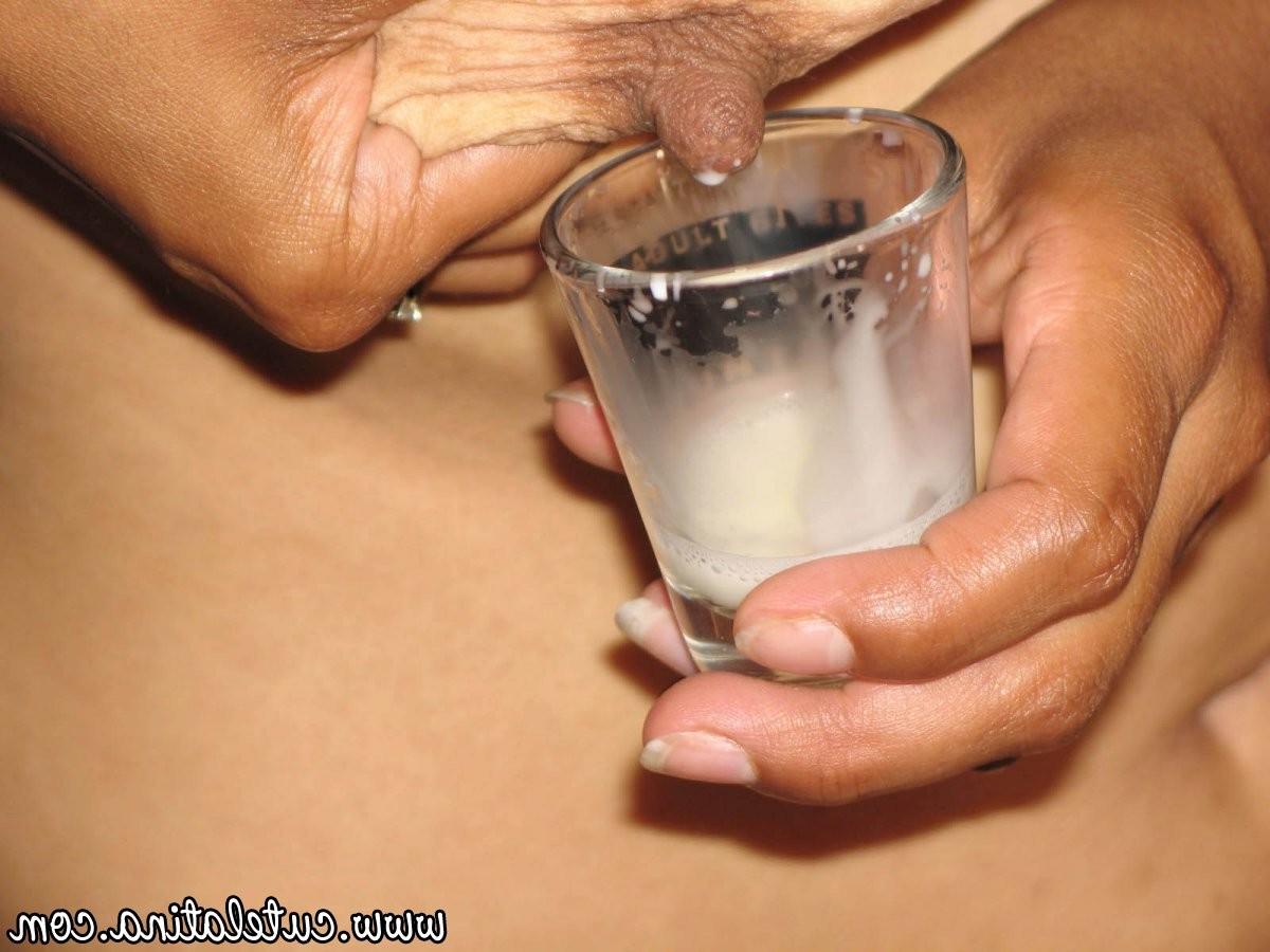 15P Talia fills a shot glass with breast milk