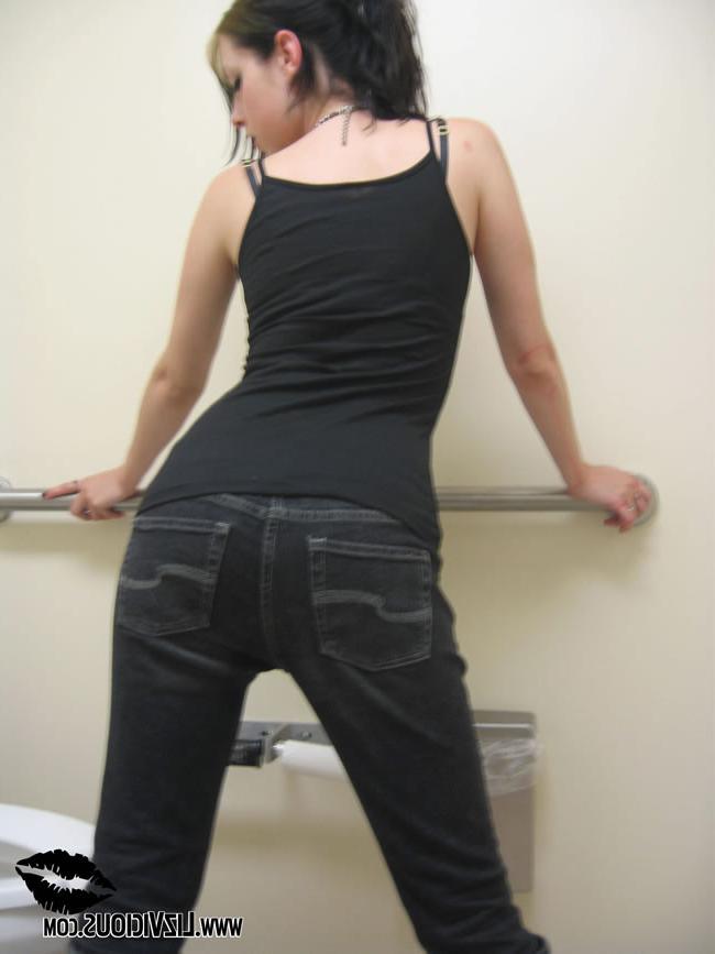 16P Goth chick in a public bathroom jams a vibrator in her pussy