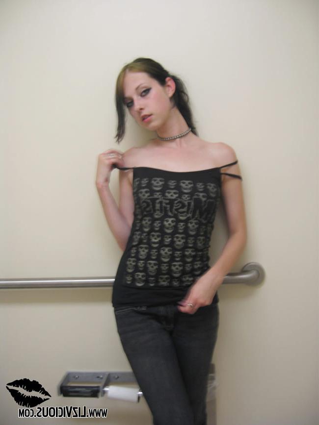 16P Goth chick in a public bathroom jams a vibrator in her pussy