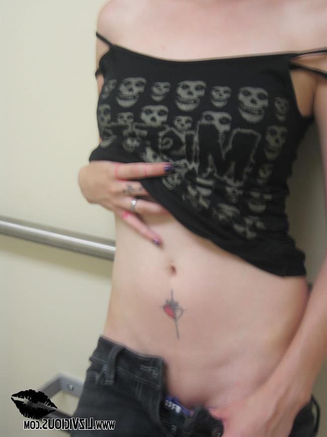 16P Goth chick in a public bathroom jams a vibrator in her pussy