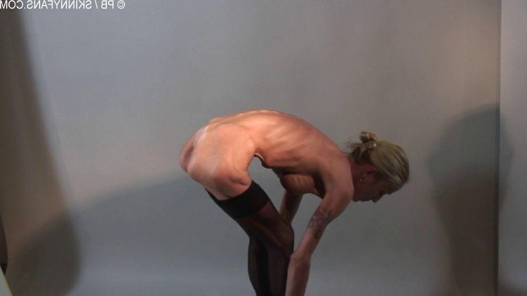 16P anorexic woman posing with a mirror