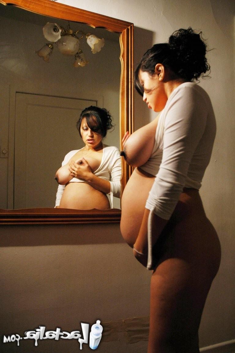 15P Talia  months pregnant posing in the mirror