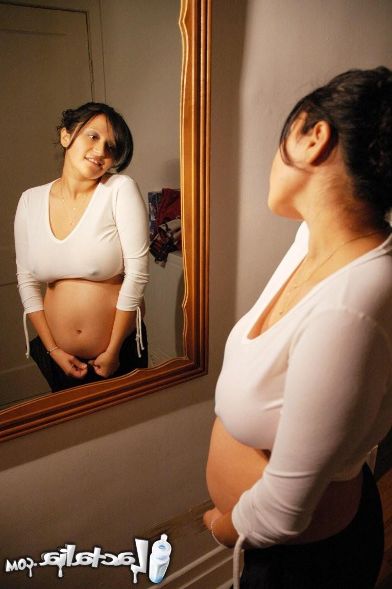 15P Talia  months pregnant posing in the mirror