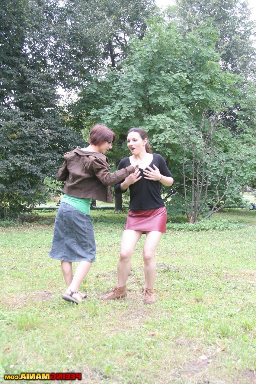 15P A la lesbian outdoor titty play and pissing games of two lusory cuties