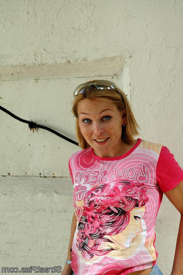 12P Leggy blonde in miniskirt wees in a deserted building