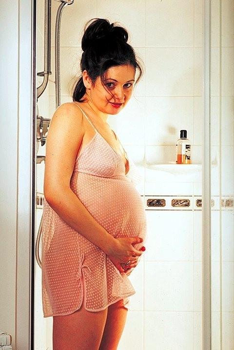 20P Horny prego babe tease loves bathing and spreading her twat