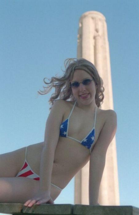 20P Curly blonde shows her tits outdoor
