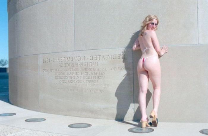 20P Curly blonde shows her tits outdoor
