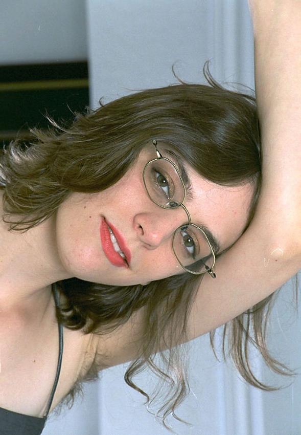 20P Curly gal showing her hairy upskirt