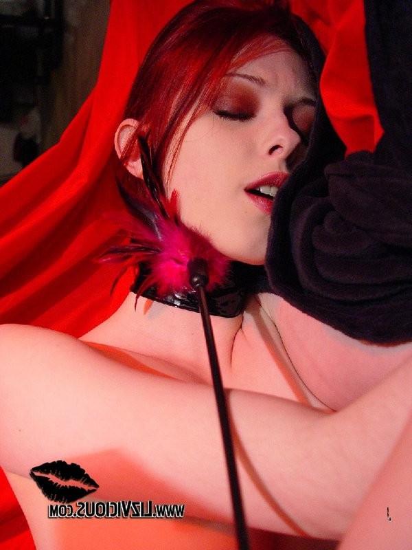 17P Beautiful tied up young redhead lady showing her shaved pussy
