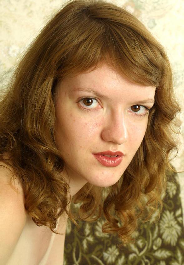 20P Amateur curly teen showing her feet