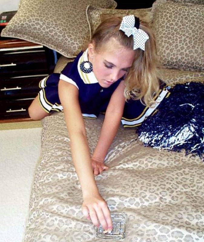 20P Blond cheerleader shows her upskirt