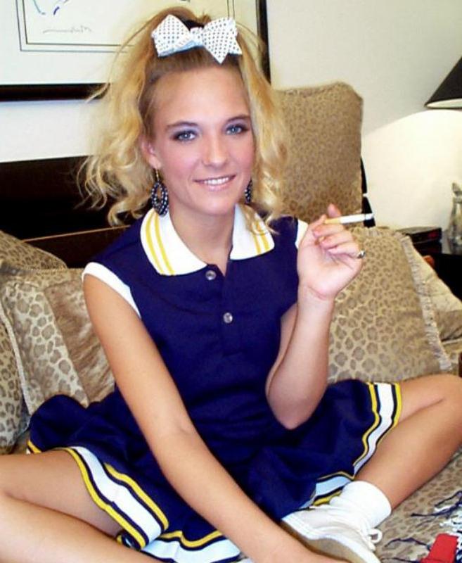 20P Blond cheerleader shows her upskirt
