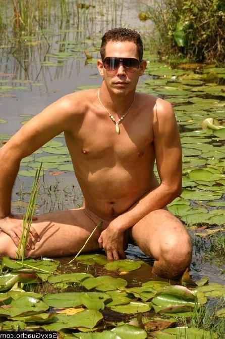 12P Very naked gay man swimming in a pond while he has a big fat erection