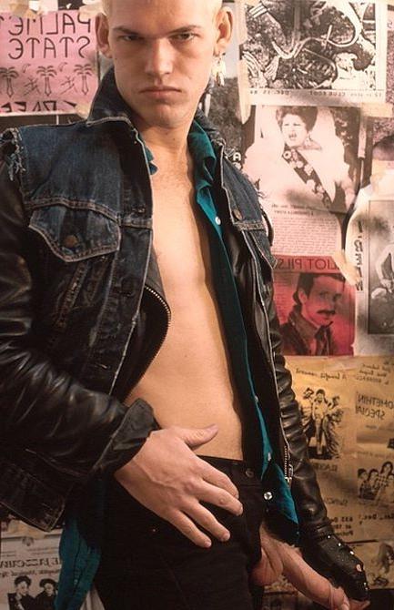 20P Fair haired big cock punk in leather stripping and showing off