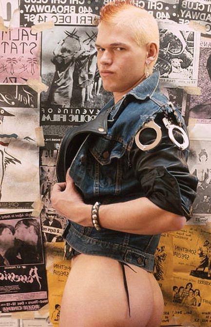20P Fair haired big cock punk in leather stripping and showing off