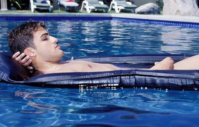 20P Sweet latin dude enjoys self dildoing and jerking off in a pool