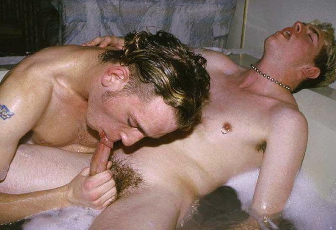 20P Blond and dark haired buds sucking treat while taking a bath
