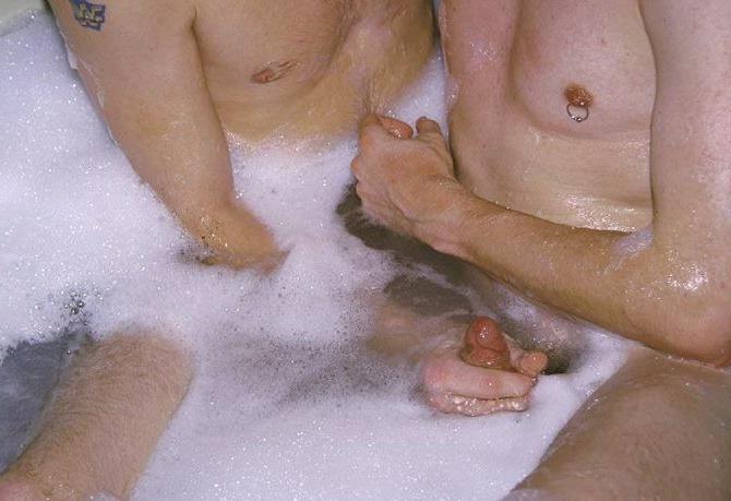 20P Blond and dark haired buds sucking treat while taking a bath