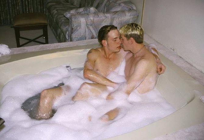 20P Blond and dark haired buds sucking treat while taking a bath