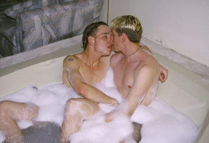 20P Blond and dark haired buds sucking treat while taking a bath