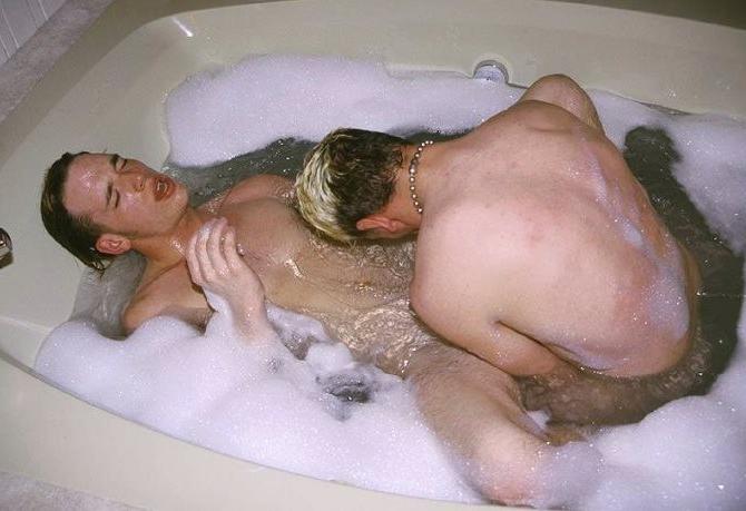 20P Blond and dark haired buds sucking treat while taking a bath
