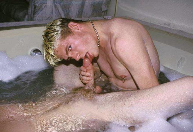 20P Blond and dark haired buds sucking treat while taking a bath