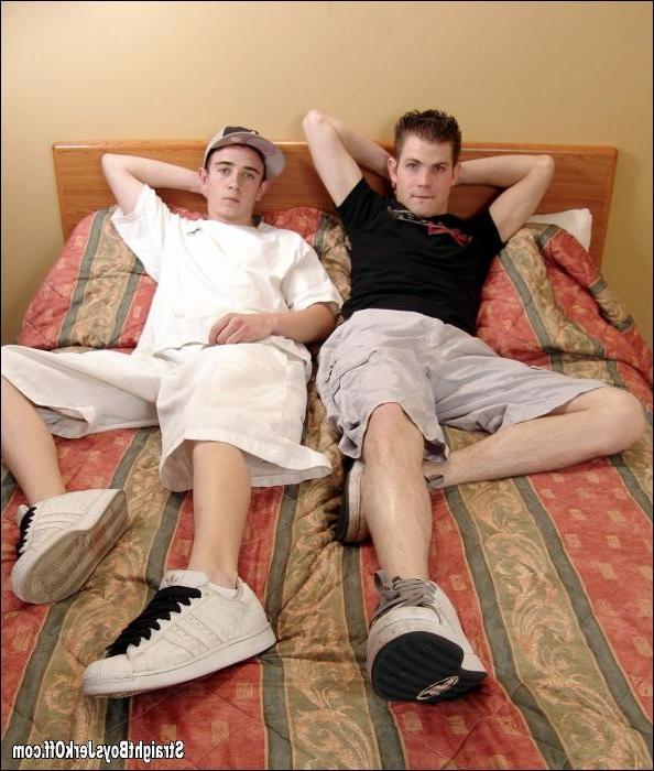 16P Two young guys jerking off together on a bed