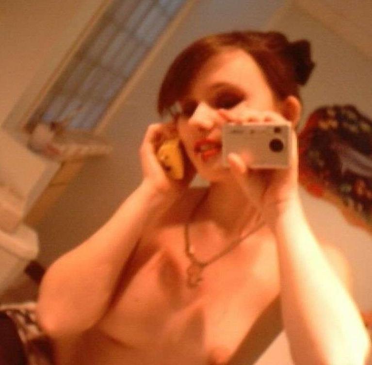 15P Photos of a blonde babe posing naked in the bathroom