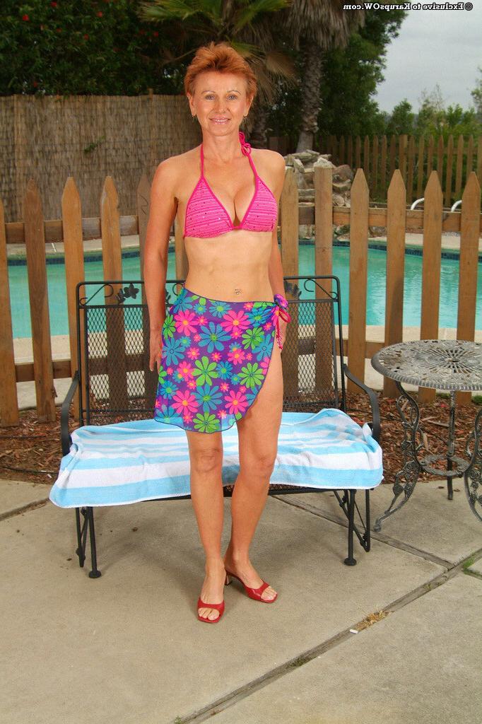 16P Short haired redhead granny outdoors in a bikini