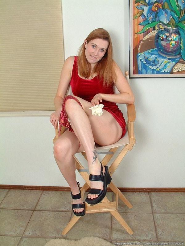 15P Redhead Andi peels off her silky thong and shows a fury muffin