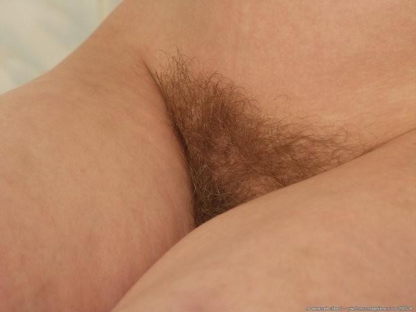 15P Marina strips off her panties in the bathroom to reveal a hairy 
