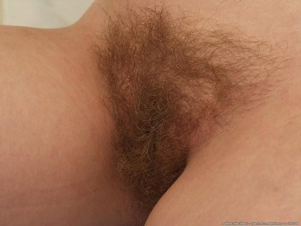 15P Marina strips off her panties in the bathroom to reveal a hairy 