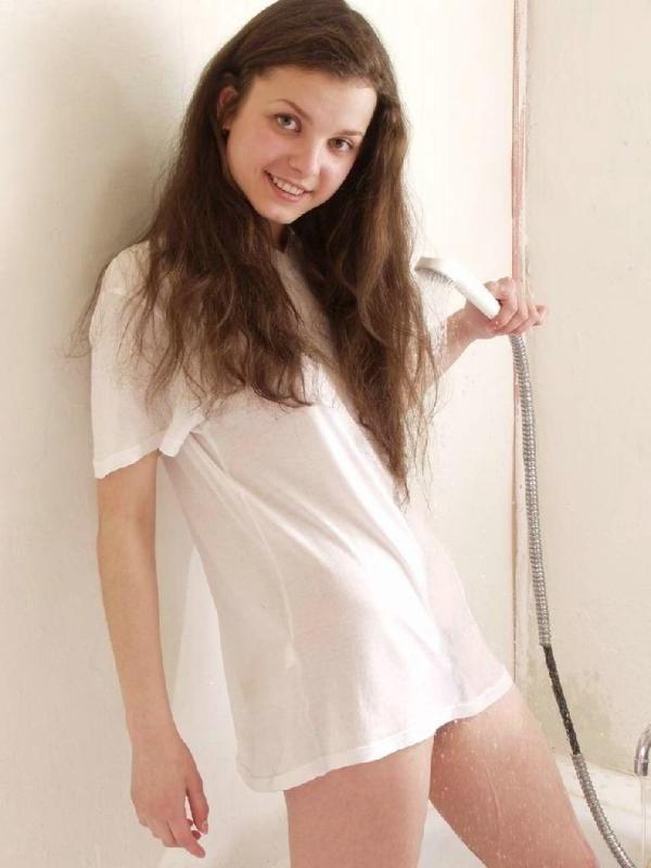 20P Gorgeous bushy twat teen loves to tease while bathing and posing