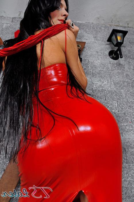 16P Black haired tranny domme in latex