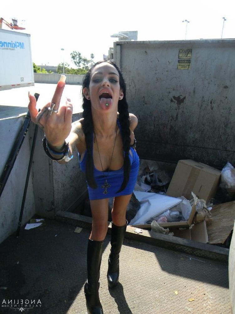 15P Angelina Valentine flashes her big fake latina tits out by the dumpster