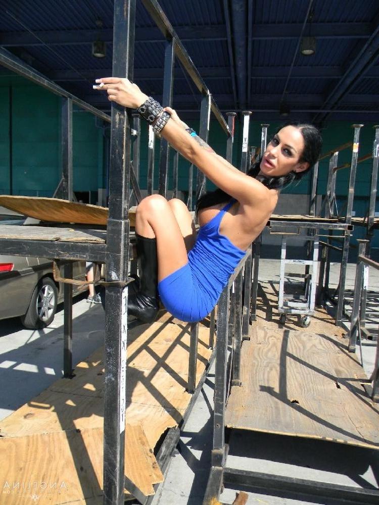 15P Angelina Valentine flashes her big fake latina tits out by the dumpster