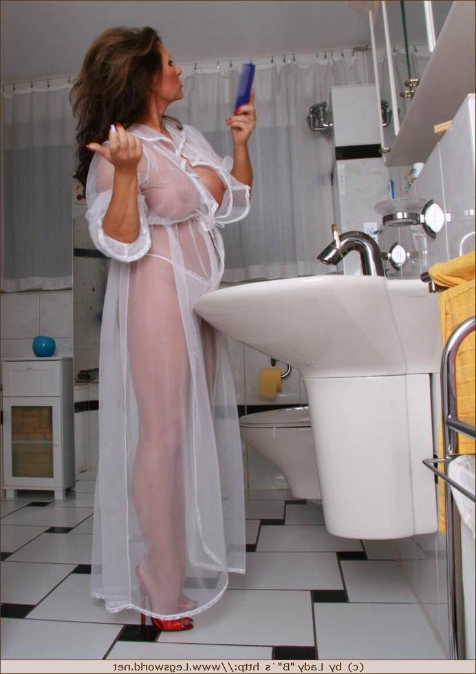 12P Leggy lady wearing white glamour lingerie